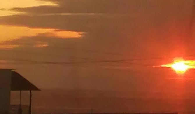 Encantadora casa con vista al mar, sol todo el año